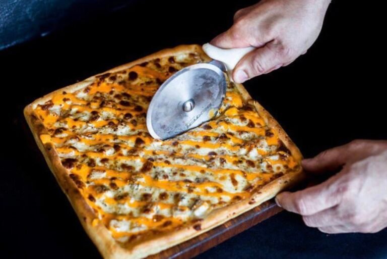 the tap room featuring santuccis original square pizza 6 768x513