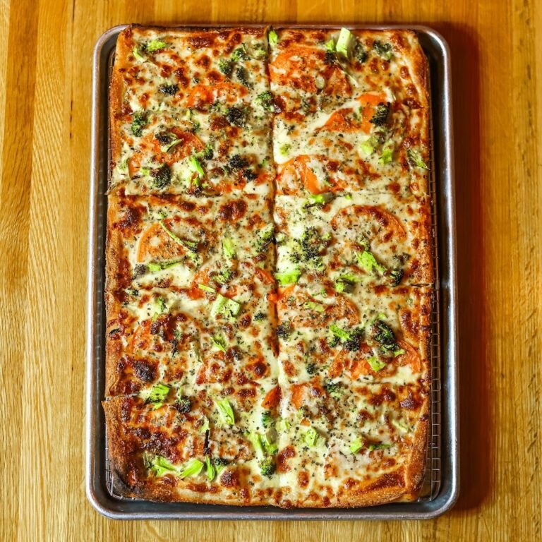 the tap room featuring santuccis original square pizza 7 768x768