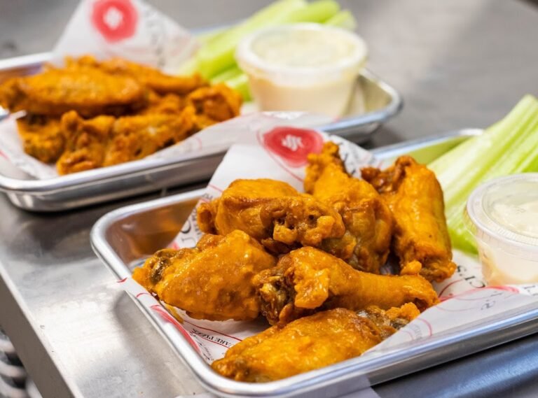 the tap room featuring santuccis original square pizza 9 768x569